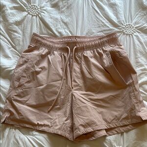 Mens Size SMALL athletic Shorts. TANISH PINK color. POCKETS